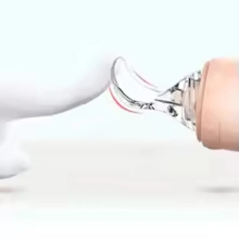 Snuggtopia™ Baby Feeding Spoon Bottle